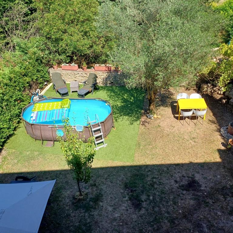 Jardí i piscina de Can MiA